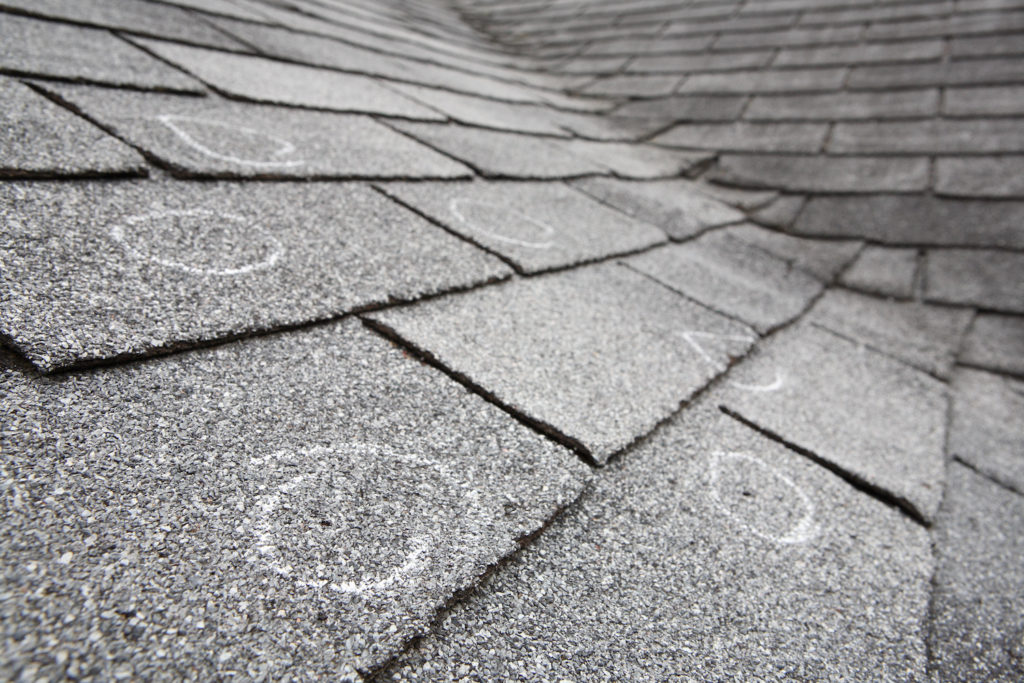 What Hail Does to an Asphalt Shingle Roof